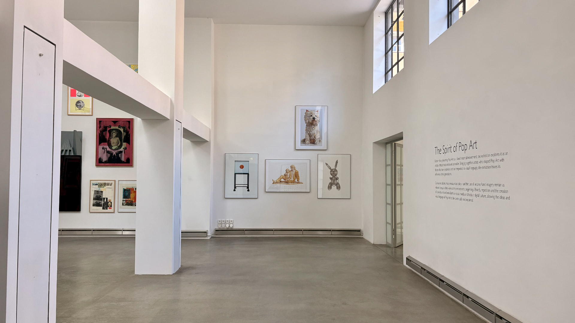 Installation view of The Spirit of Pop Art: gallery room with framed works